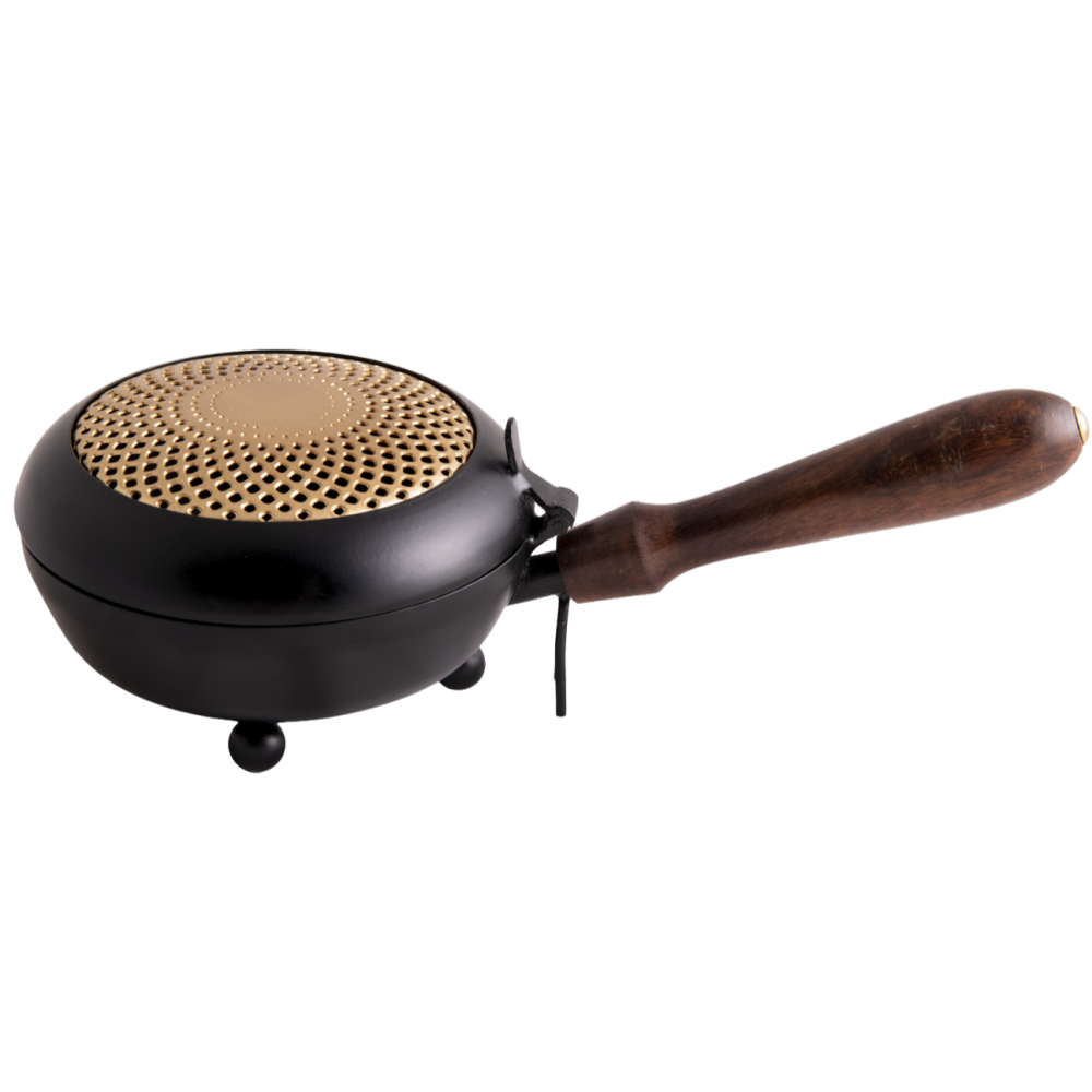 Carrying vessel Sun – iron incense burner with wooden handle